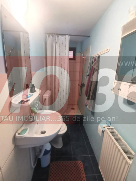 Casa cu 1338 mp teren– 3 dormitoare,2 bai, zona superba