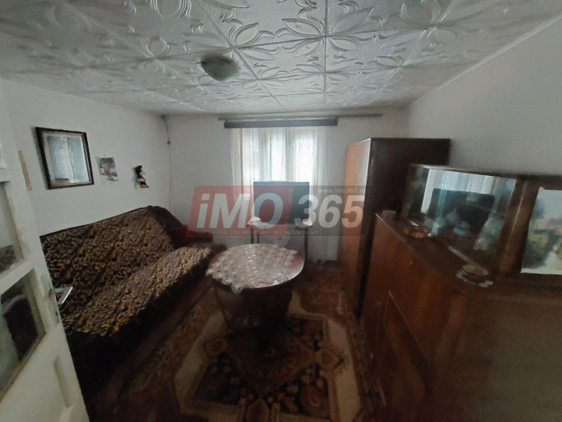 Teren Bascov 1754mp-izvor pe teren-intre case-la 700m de sens Bascov