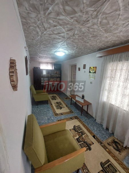 Teren Bascov 1754mp-izvor pe teren-intre case-la 700m de sens Bascov
